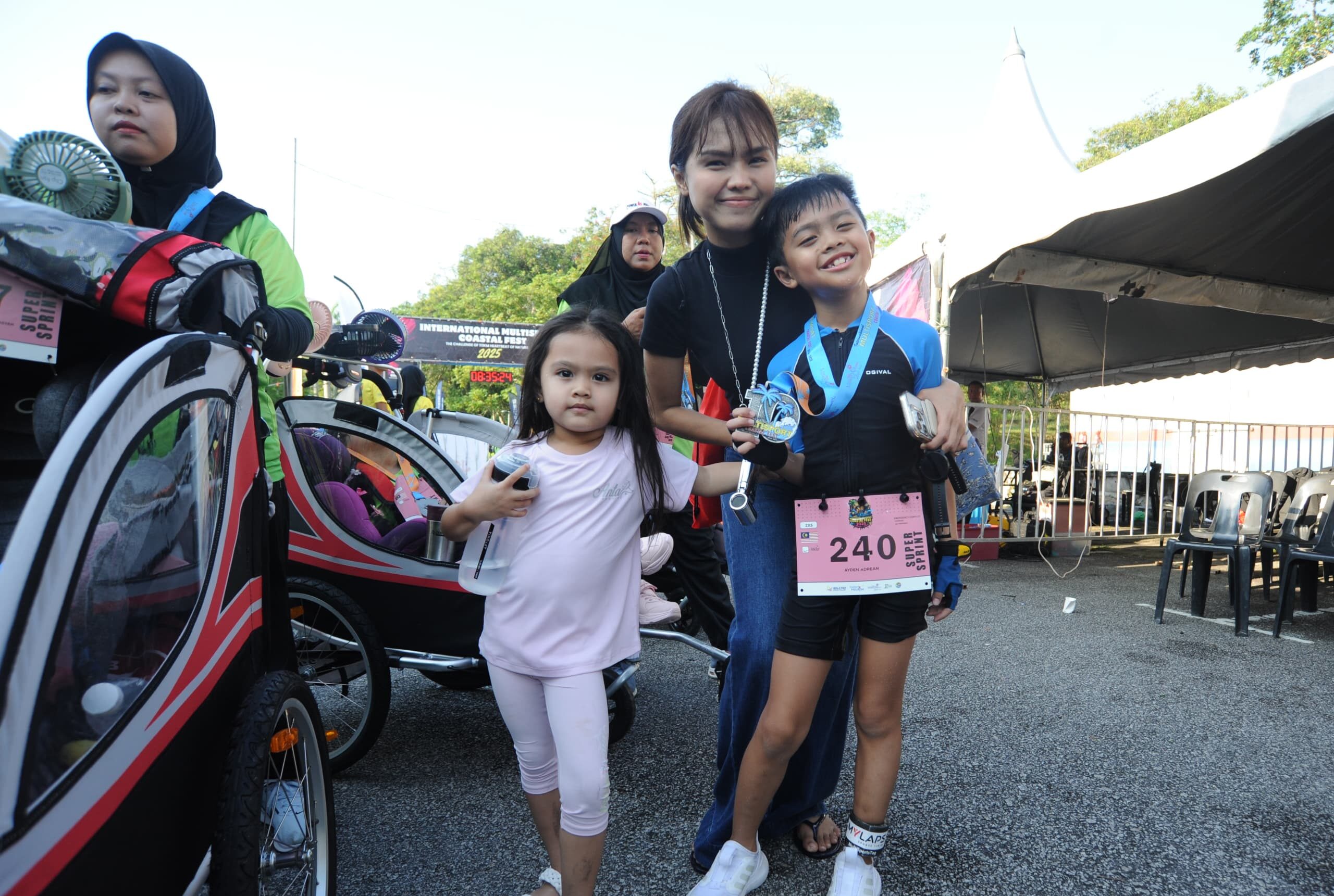 Sweetnya Bella, teman Syed Saddiq, Ayden masuk triathlon Desaru