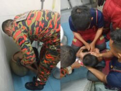 Budak lapan tahun tersangkut dalam tempayan