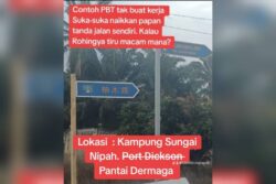 Tular papan tanda tulisan Cina di Port Dickson