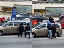 [VIDEO] Lelaki panjat bumbung teksi atas lebuh raya