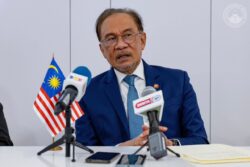 Anwar bangkitkan isu MH17 di hadapan Putin