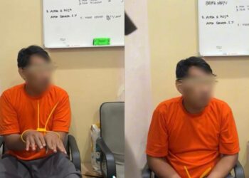 Bimbang dipukul penduduk, perompak hubungi polis 