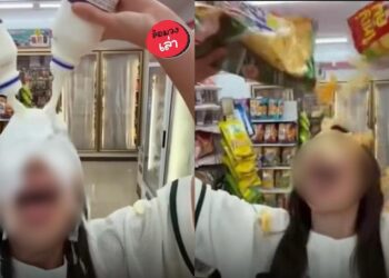 Wanita tuang susu, snek pada badan dalam kedai serbaneka