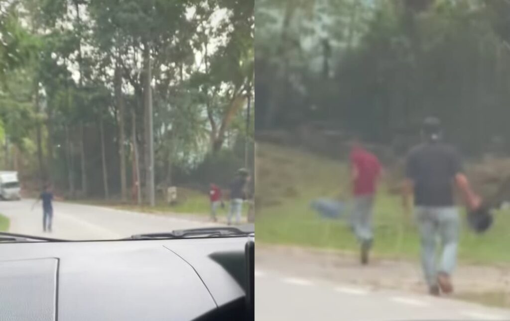 [VIDEO] Aksi lelaki berparang panjat lori tengah jalan resahkan orang Ulu Yam