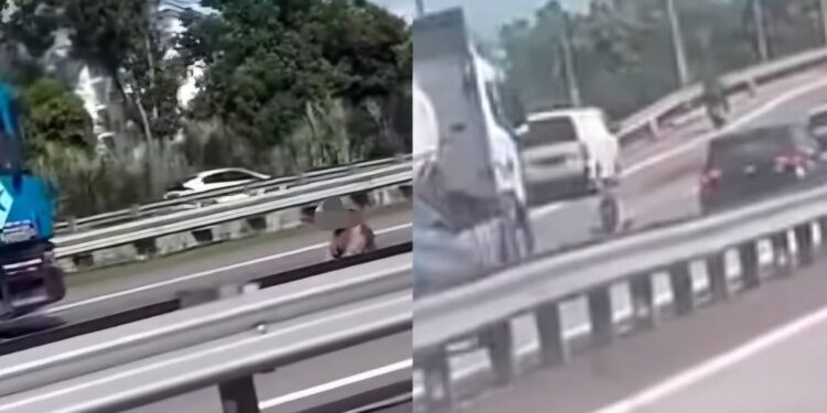 [VIDEO] Wanita bersila tengah lebuh raya