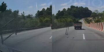 [VIDEO] Bingkai besi tercampak dari lori, mujur sempat elak